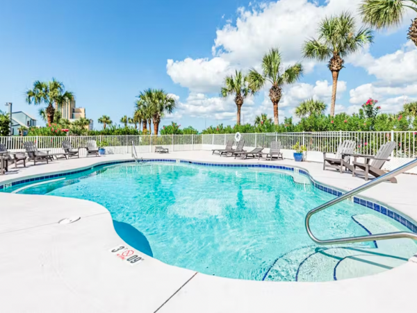 Orange Beach 8 Bedroom Home with Shared Pool & Grill Sleeps 20