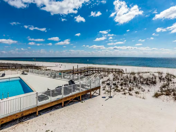Orange Beach 8 Bedroom Home with Shared Pool & Grill Sleeps 20