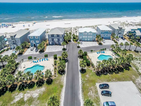 Orange Beach 8 Bedroom Home with Shared Pool & Grill Sleeps 20
