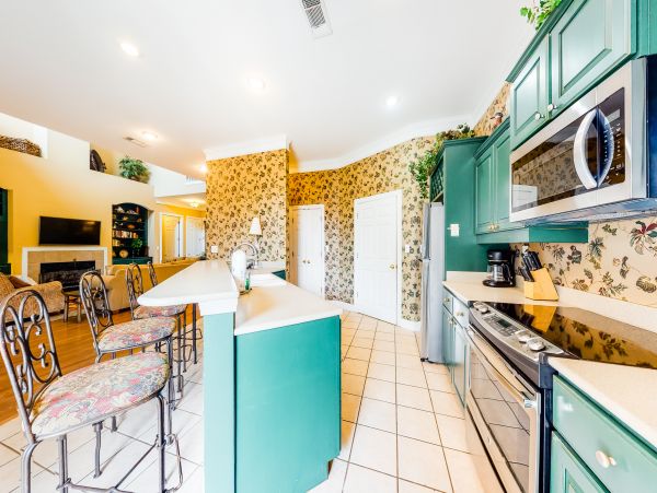 Luxurious four bedroom home near the beach with resort amenities