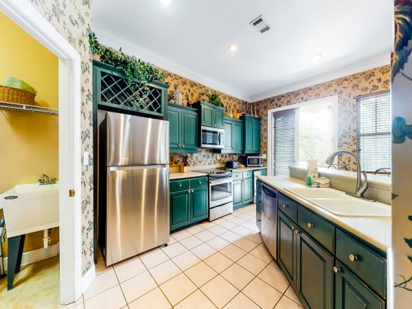 Luxurious four bedroom home near the beach with resort amenities