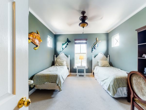 Luxurious four bedroom home near the beach with resort amenities