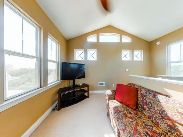 Luxurious four bedroom home near the beach with resort amenities
