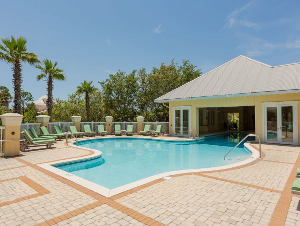 Luxurious four bedroom home near the beach with resort amenities