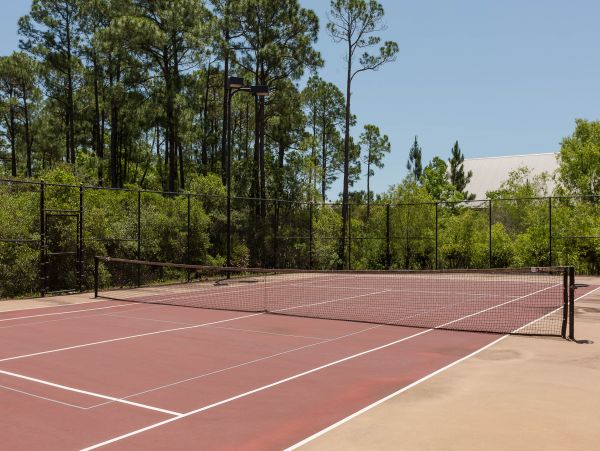 Luxurious four bedroom home near the beach with resort amenities