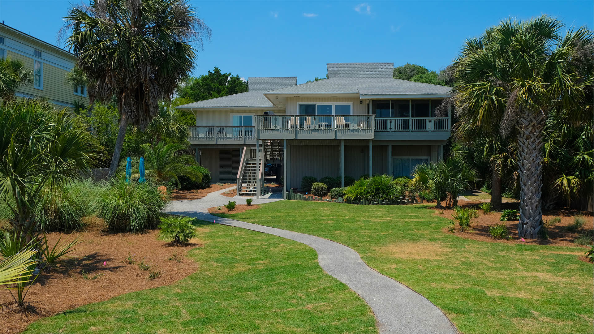 Oceanfront Beach Home with Gorgeously Landscaped Yard