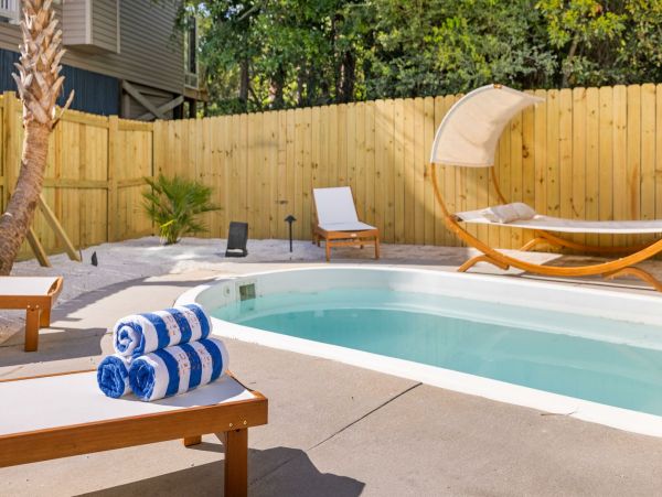 Coastal Chic 6-Bedroom Retreat with Private Pool, Steps from Folly Beach