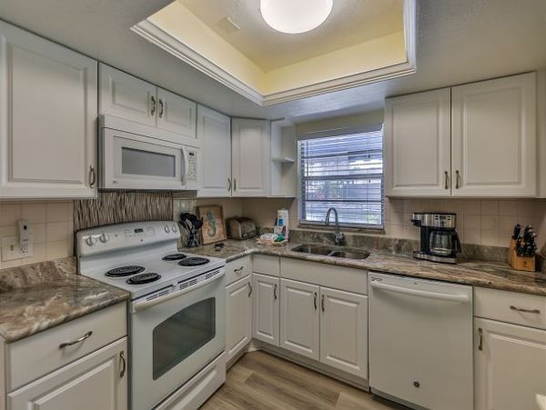 Sanibel 2 Bedroom Condo with Canal Views & Boat Dock
