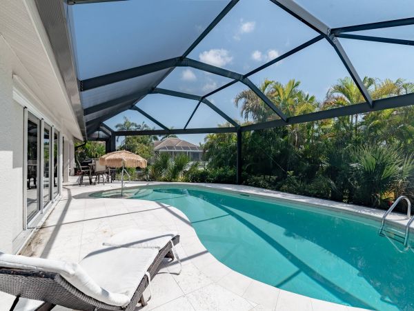 Marco Island 3 Bedroom Canal Front Home with Dock and Pool