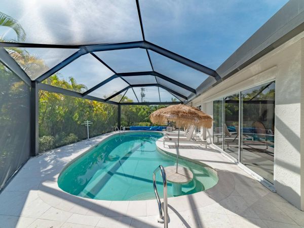 Marco Island 3 Bedroom Canal Front Home with Dock and Pool