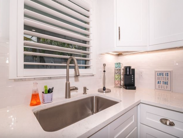 Cute one bedroom duplex steps to beach