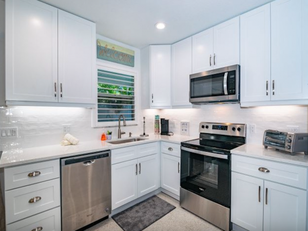 Cute one bedroom duplex steps to beach