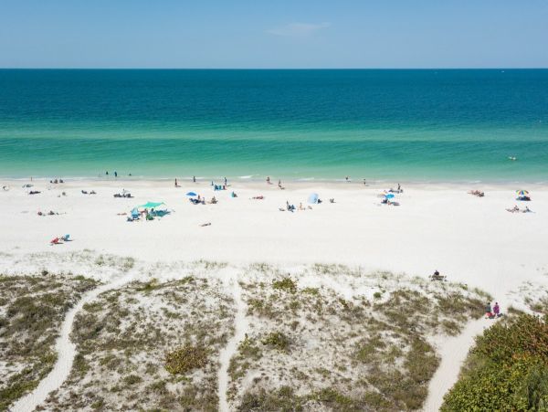 Walk to shops, restaurants and the beach!