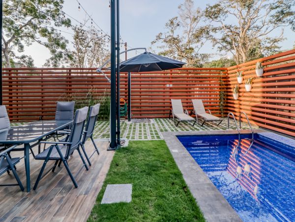 Ground-Floor Unit with Pool & Outdoor Dining Walk to Beach