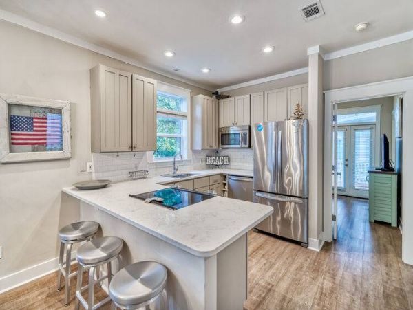Three story home with 3 bedrooms and one block to the beach