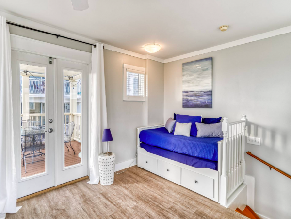 Three story home with 3 bedrooms and one block to the beach