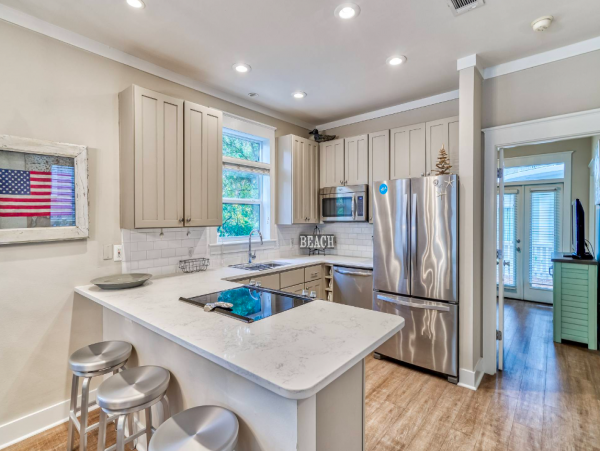 Three story home with 3 bedrooms and one block to the beach