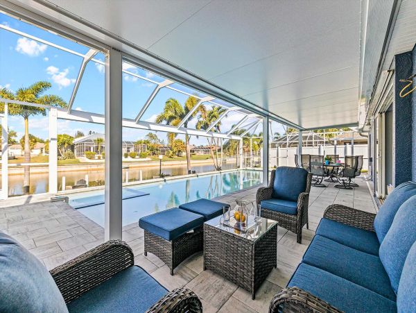 Cape Coral 4 Bedroom Pool Home with Canal View & Dock