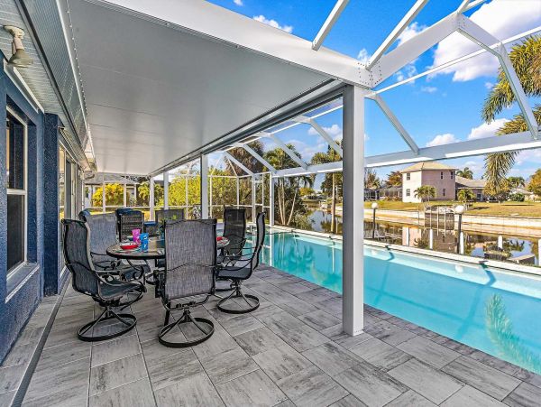 Cape Coral 4 Bedroom Pool Home with Canal View & Dock