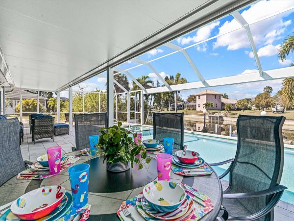 Cape Coral 4 Bedroom Pool Home with Canal View & Dock