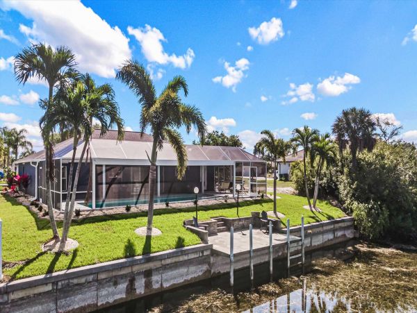 Cape Coral 4 Bedroom Pool Home with Canal View & Dock