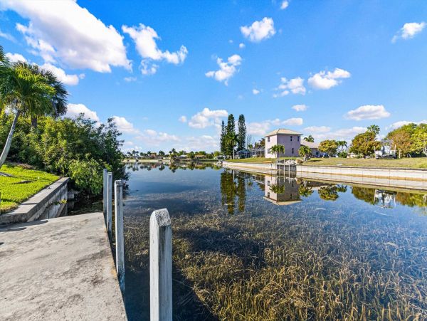 Cape Coral 4 Bedroom Pool Home with Canal View & Dock