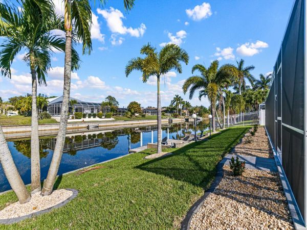 Cape Coral 4 Bedroom Pool Home with Canal View & Dock