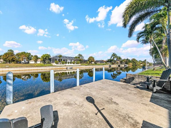 Cape Coral 4 Bedroom Pool Home with Canal View & Dock