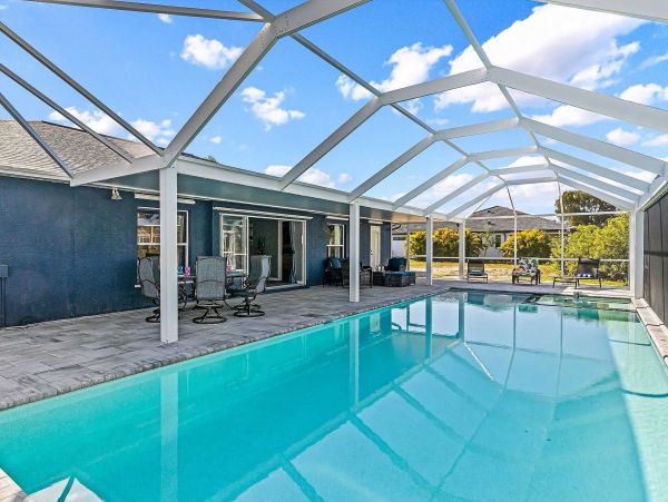 Cape Coral 4 Bedroom Pool Home with Canal View & Dock
