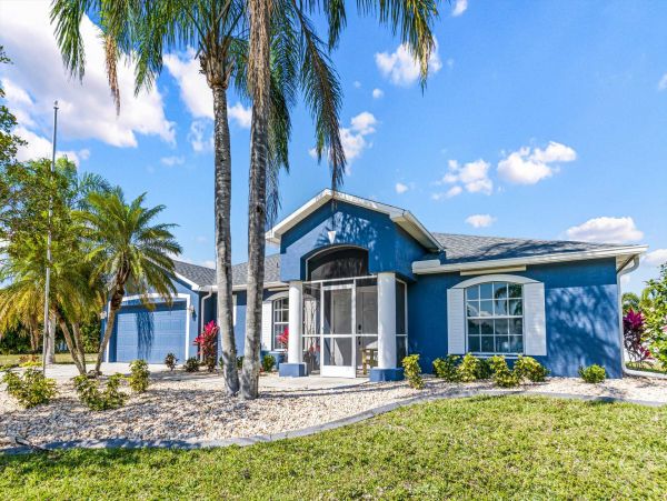 Cape Coral 4 Bedroom Pool Home with Canal View & Dock