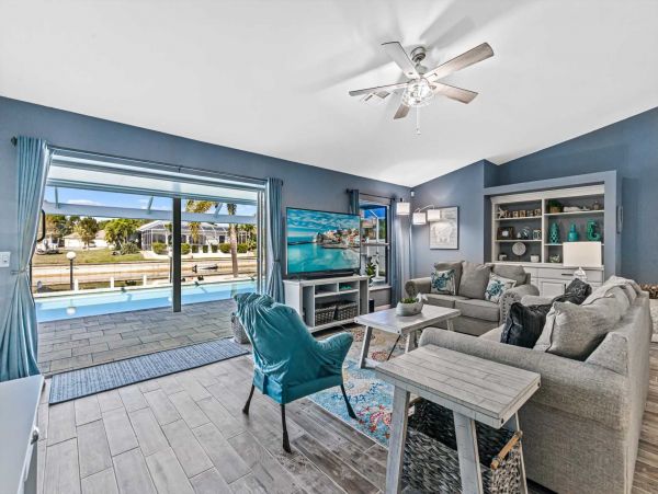 Cape Coral 4 Bedroom Pool Home with Canal View & Dock