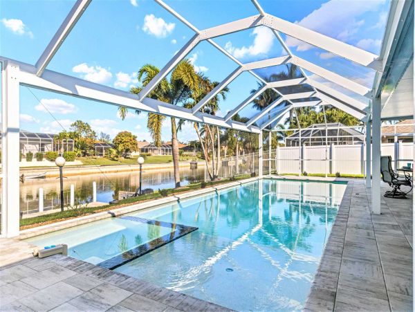Cape Coral 4 Bedroom Pool Home with Canal View & Dock