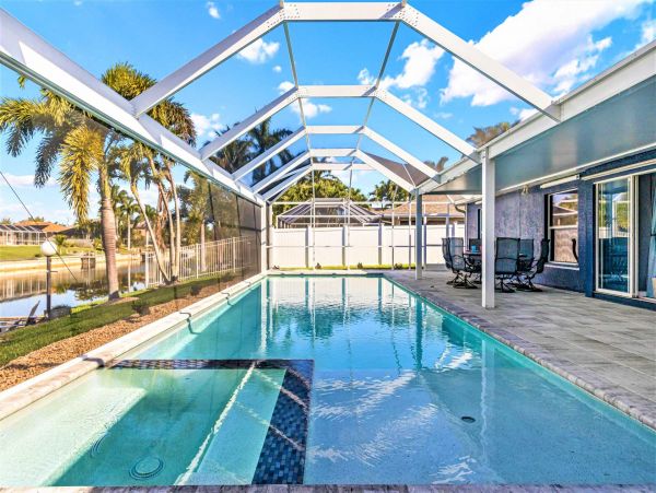 Cape Coral 4 Bedroom Pool Home with Canal View & Dock