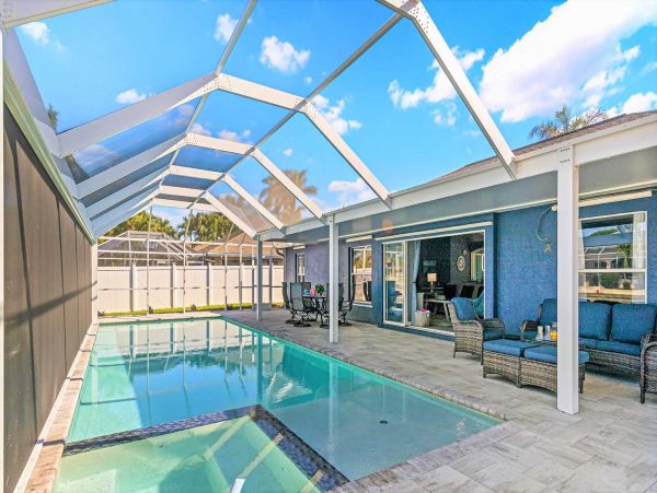 Cape Coral 4 Bedroom Pool Home with Canal View & Dock