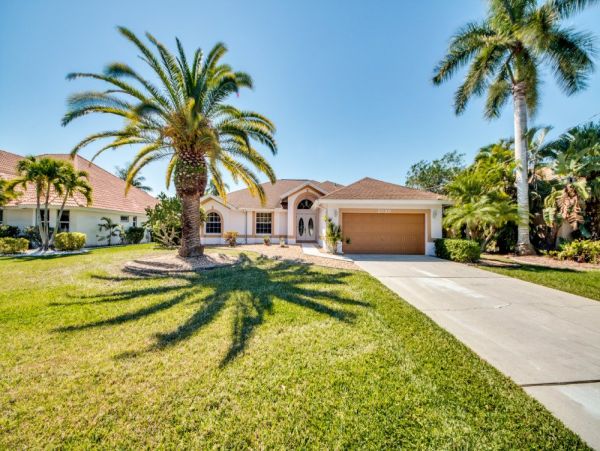 Vacation Home in Cape Coral with Caged Pool and Boat Dock