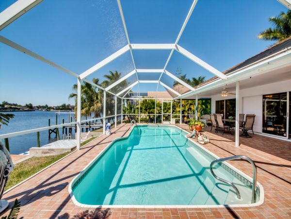 Vacation Home in Cape Coral with Caged Pool and Boat Dock