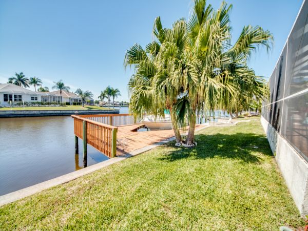 Vacation Home in Cape Coral with Caged Pool and Boat Dock