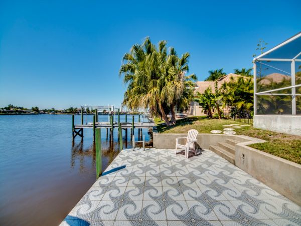 Vacation Home in Cape Coral with Caged Pool and Boat Dock
