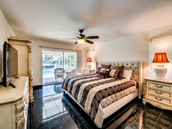 Vacation Home in Cape Coral with Caged Pool and Boat Dock