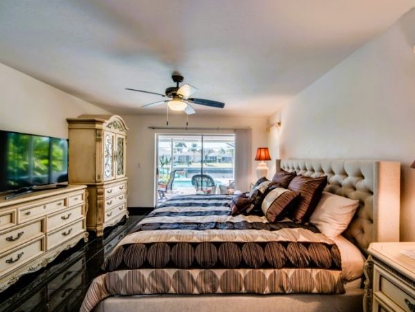Vacation Home in Cape Coral with Caged Pool and Boat Dock