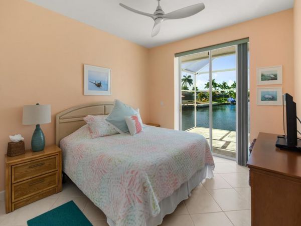 Canal-Front Vacation Home with Pool and Boat Dock