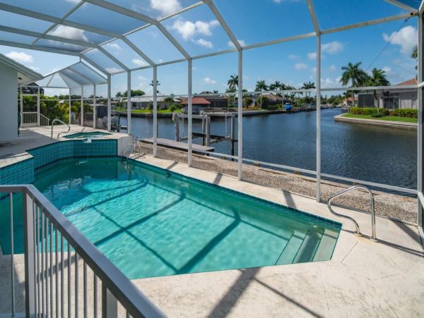 Canal-Front Vacation Home with Pool and Boat Dock