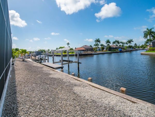 Canal-Front Vacation Home with Pool and Boat Dock