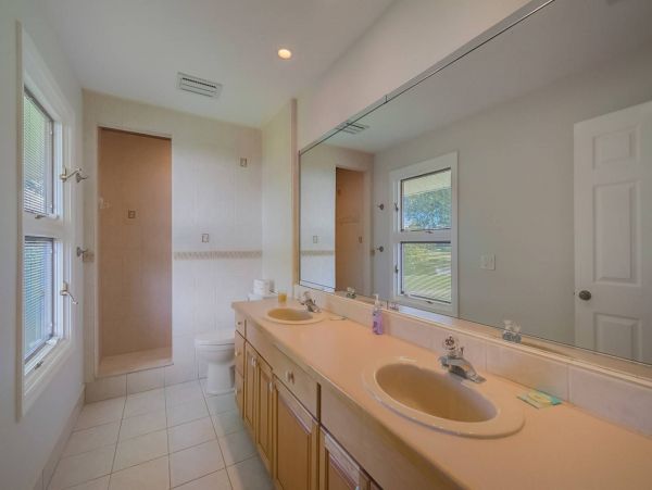 Large upstairs bathroom with walk-in shower and double sinks