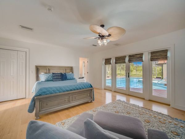 Master suite on the ground floor with gorgeous views of the pool and your own en-suite bathroom.