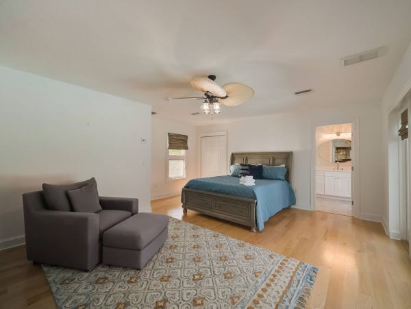 One of two large master suites downstairs with King bed and sitting area