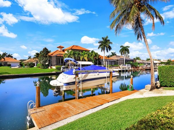 Three Bedroom Home with Canal View & Dock