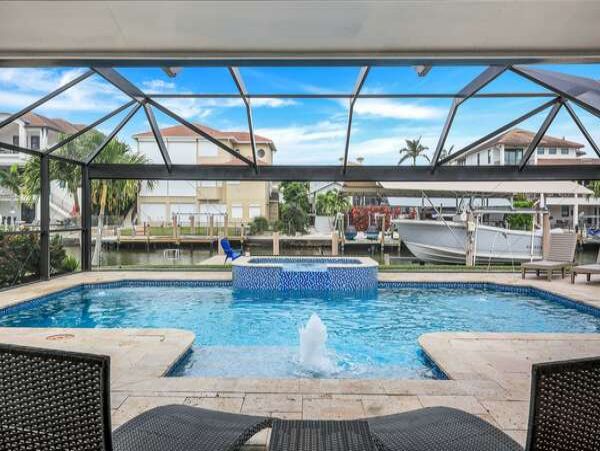 Canal-Front Vacation Home with Pool and Boat Dock in Naples
