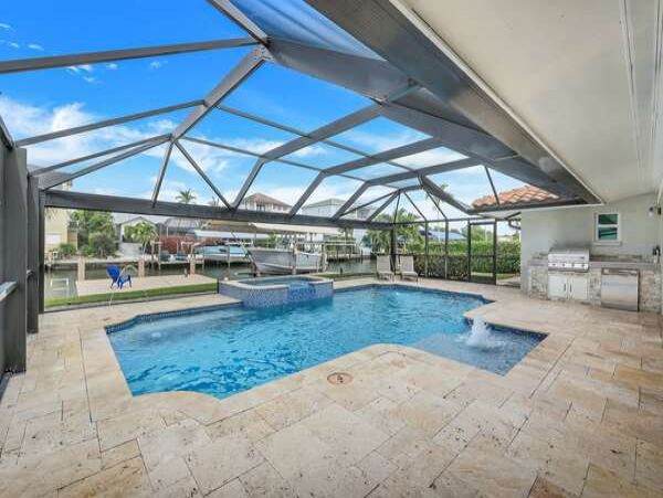 Canal-Front Vacation Home with Pool and Boat Dock in Naples