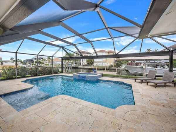 Canal-Front Vacation Home with Pool and Boat Dock in Naples